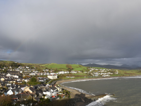 rainbow by the shore